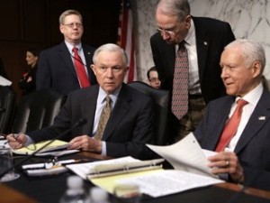 PHOTO: Sen. Chuck Grassley, R-IA, leans down to talk to Sen. Jeff Sessions, R-AL, 2nd right, and Sen. Orrin Hatch, R-UT, right, prior to a hearing before the Senate Judiciary Committee, April 19, 2013, on 